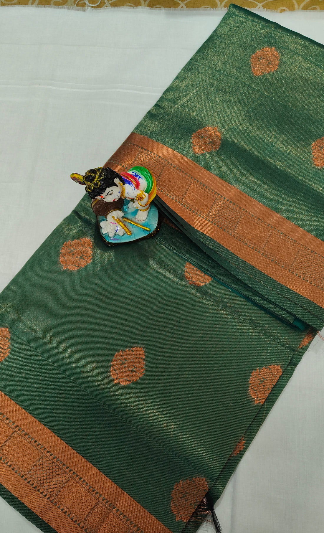 Green Linen Tissue Saree with Orange Zari Border