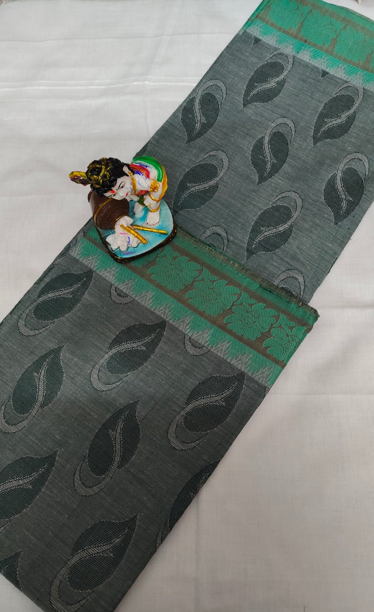 Nagamam Empose Cotton Saree with Leaf Motifs and Green Border
